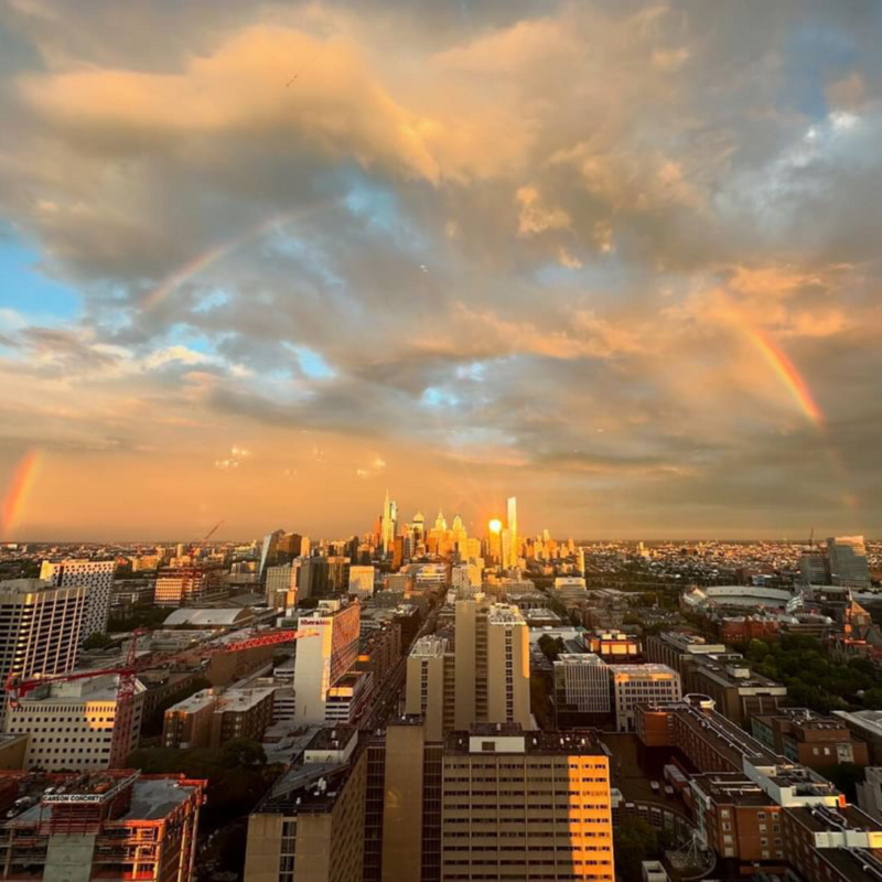 Philadelphia Skyline from the rooftop of a Penn dorm looking at the city skyline with a rainbow over it